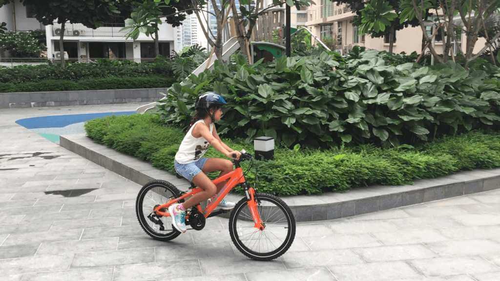 Anaiya and her handsome new orange ride