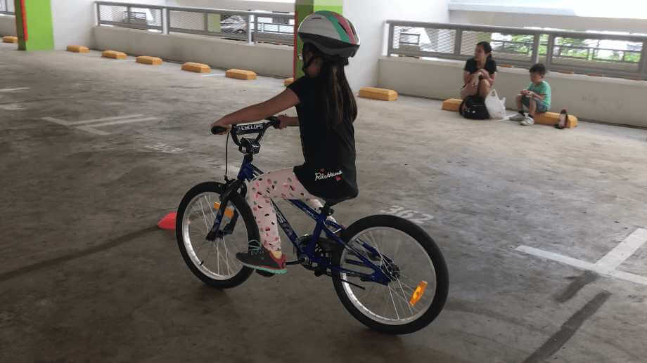 All he takes is 2 lessons and my girl is happily cycling on 2 wheels. Thank You Fai!!